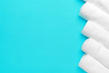 Clean soft towels on color background