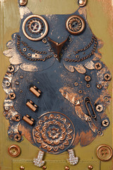 Steampunk style bird owl. Mechanical animal photo cover book.