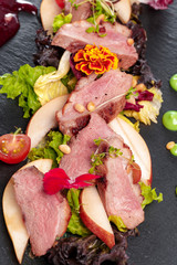 grilled meat : beef ( lamb ) garnished with tomatoes ,lettuce