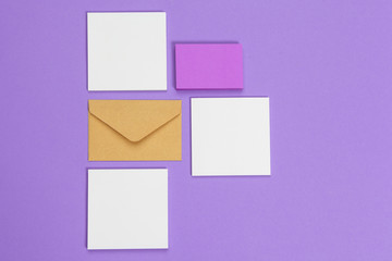 mock up concept. cards Papers on purple  background. Top view, flat lay, copy space