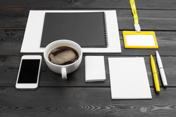 Blank corporate stationery set on wood table background. Branding mock up.