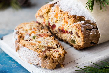 Traditional Christmas stollen with dried fruit and candied fruits