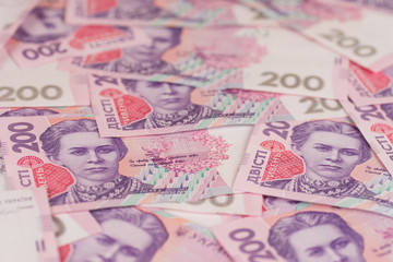 Fototapeta na wymiar Ukrainian money. Background of the two hundred hryvnia banknotes.