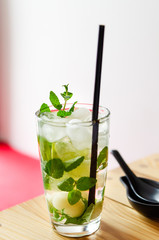 Lychee Mojito, Lychee fizzy drink with mint. Shooting in a restaurant, close-up.