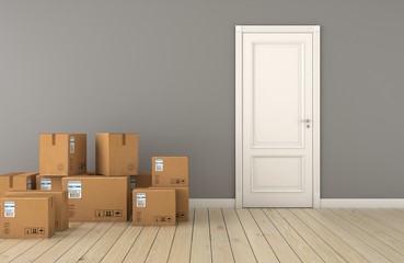 Moving boxes at a new home with door. Apartment, concepts.