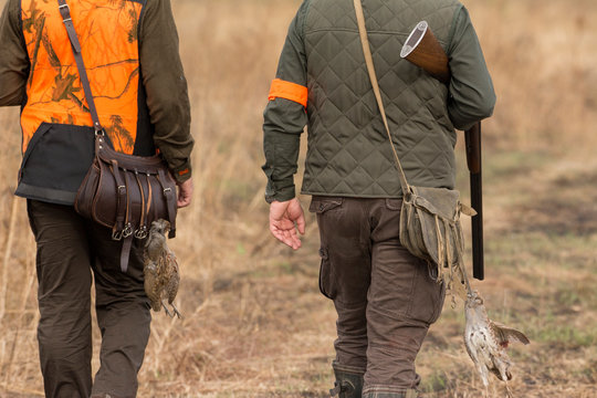 The hunter in the hunting clothes and with rifle hunts