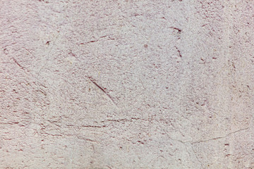 Old wall painted with pink paint as a background