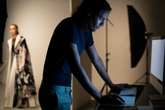 Art director checking photos on a monitor