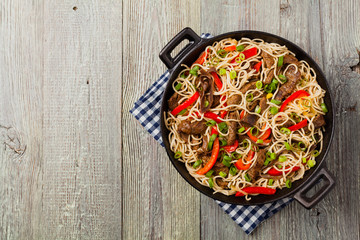 Chinese pasta with beef. Prepared in wok.