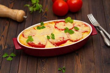Potato casserole with meat, tomatoes and cheese