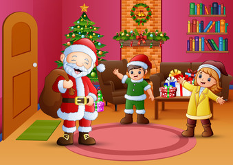 Happy santa and two kids in the living room with christmas tree