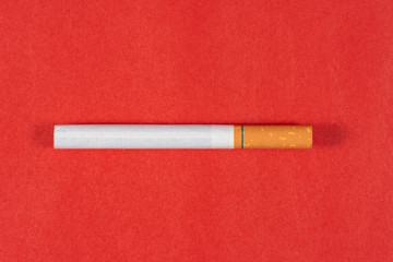 Tobacco Cigarette close up with red background