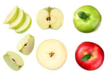 green and red apples with slices isolated on white background. top view