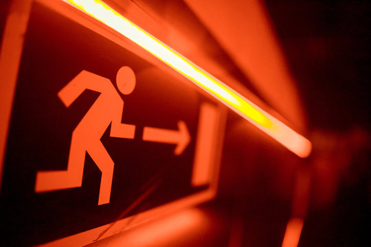 Fire exits in car park area and frame of fire burn.