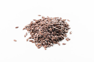 Flax seeds on a white background, top view