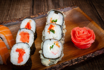 sushi on wooden table
