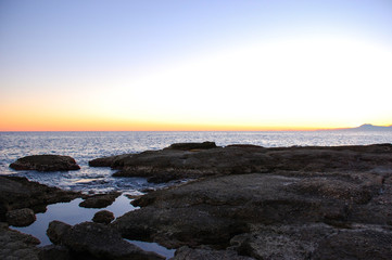 Obraz premium Sunset at sea port