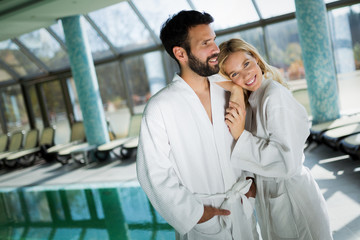 Portrait of attractive couple in spa center
