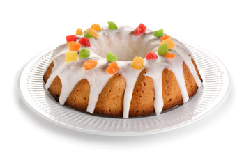 Plate with delicious Christmas cake on white background