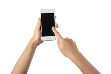 Young woman using mobile phone on white background
