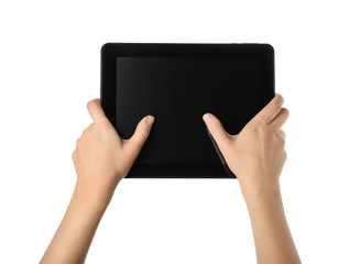 Young woman holding tablet PC on white background