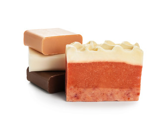 Different soap bars on white background