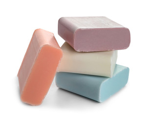 Different soap bars on white background
