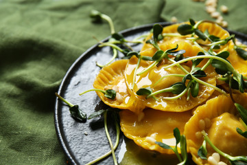 Tasty ravioli on plate, closeup