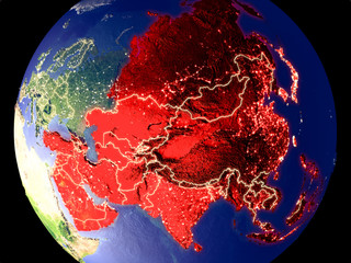 Asia from space on Earth at night. Very fine detail of the plastic planet surface with bright city lights.
