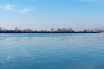 blue water and clouds on sky