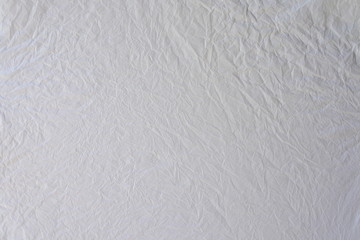 Crumpled white plastic texture 