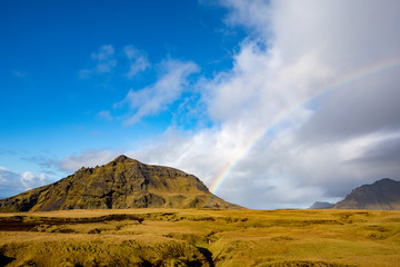 Rainbow over the mountains of Iceland