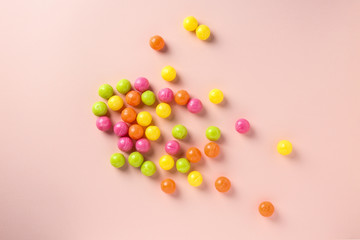 Fototapeta na wymiar Tasty sweet candies on color background