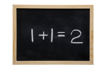 Obraz premium WOODEN FRAMED BLACK BOARD WITH THE SUM ONE PLUS ONE EQUALS TWO WRITTEN WITH WHITE CHALK