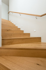 Detail of wooden stairway in modern house