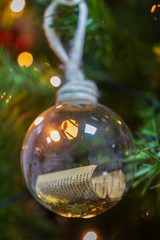 Fototapeta na wymiar Christmas Tree of a hanging decorative message ball in sight