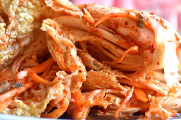 Korean kimchi sidedish on neutral background.