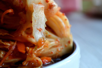 Korean kimchi sidedish on neutral background.