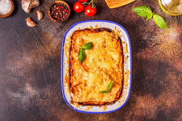 Traditional italian lasagna with vegetables, minced meat and cheese.