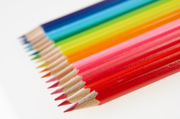 ROW OF COLOURED PENCILS