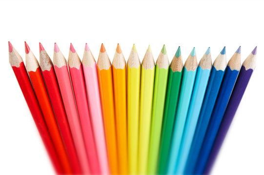 STANDING ROW OF COLOURED PENCILS
