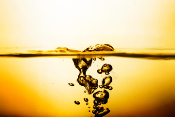 Bubbles in Water Oil, gold Beautiful abstract background 