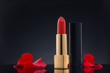 Red lipstick and petals.