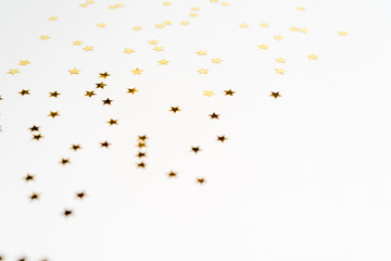 Group of gold star decoration isolated on white background top view