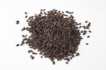 Black sesame seeds isolated on white background