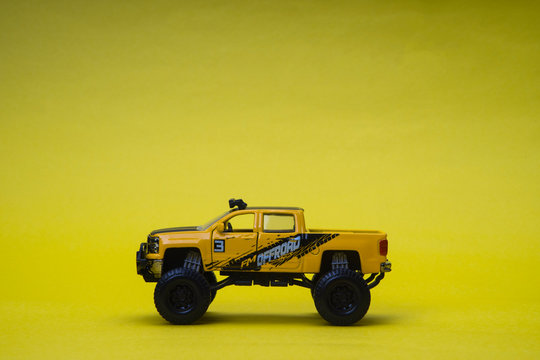 yellow off-road vehicle