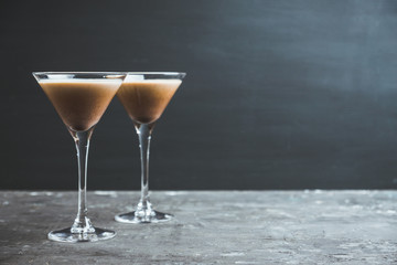 Chocolate martini with spices on the rustic background. Selective focus. Shallow depth of field.