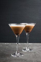 Chocolate martini with spices on the rustic background. Selective focus. Shallow depth of field.