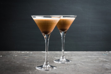 Chocolate martini with spices on the rustic background. Selective focus. Shallow depth of field.