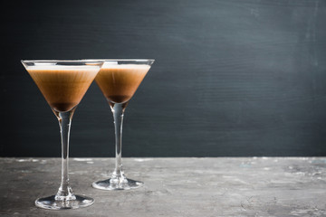 Chocolate martini with spices on the rustic background. Selective focus. Shallow depth of field.